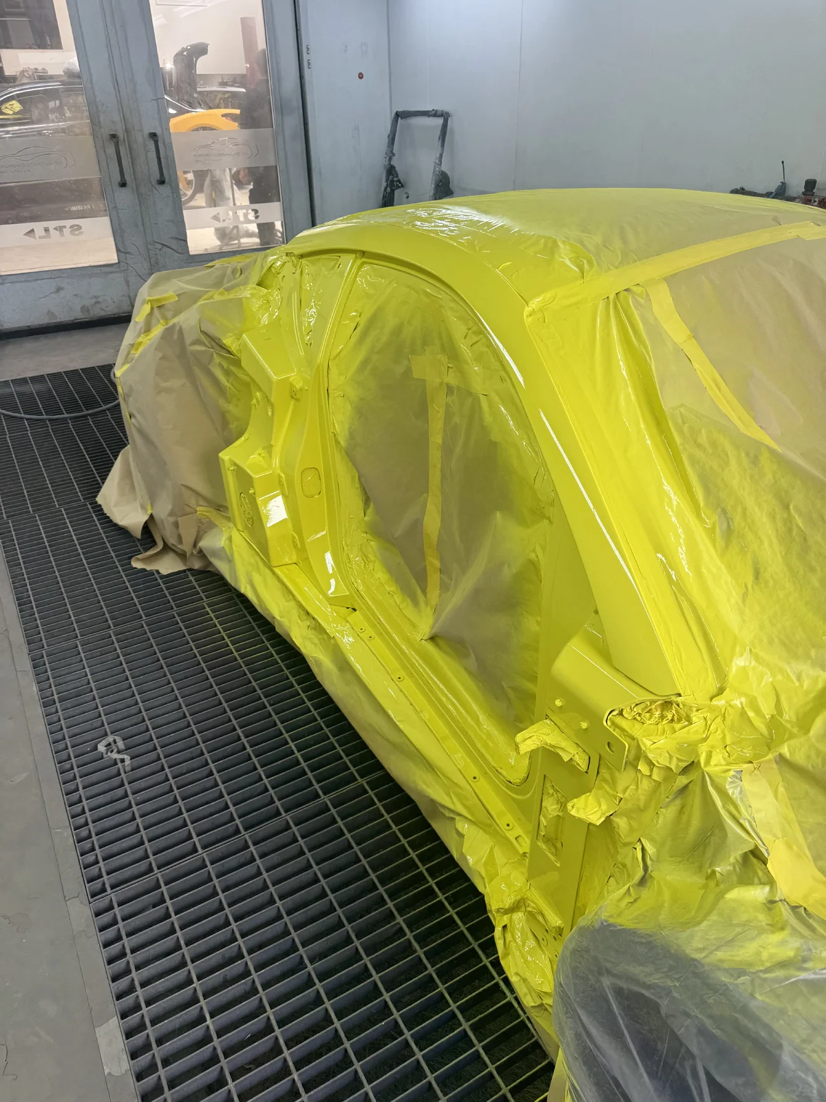 Beaconsfield_Workshop_New_Yellow_Drivers_Side.webp