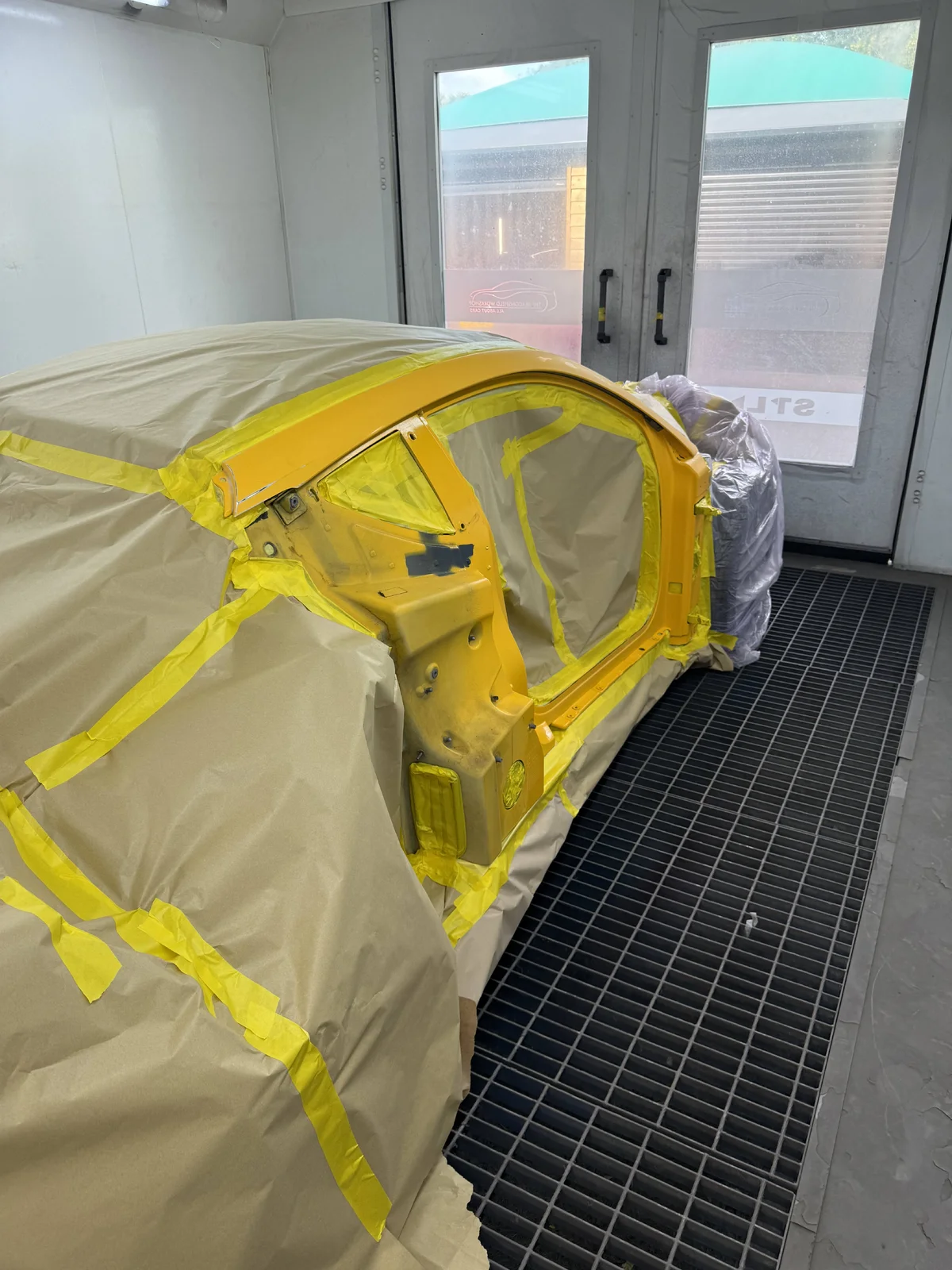 Beaconsfield_Workshop_New_Yellow_Drivers_Side_Prep.webp