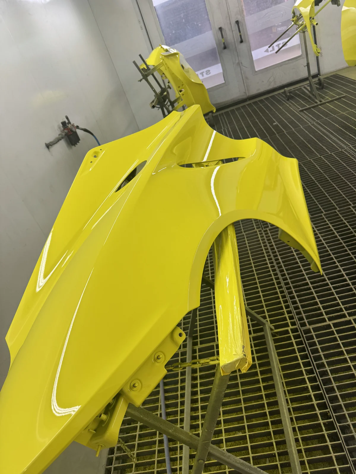 Beaconsfield_Workshop_New_Yellow_Rear_Quarter.webp