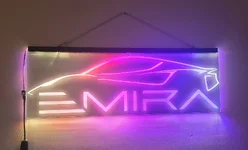 Emira Neon signc.webp