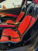 Emira red mock up B10XL seats.webp