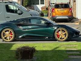 Gold or bronze wheels on Dark Verdant Green Emira