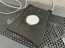 Feeding cable from USB socket to trinket tray