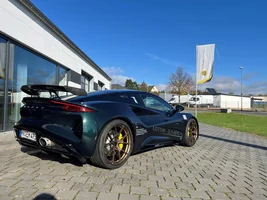 Gold or bronze wheels on Dark Verdant Green Emira