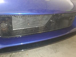 Slight surface rust on front bumper grates