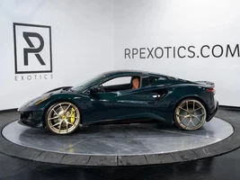 Gold or bronze wheels on Dark Verdant Green Emira