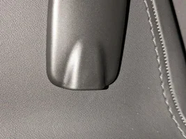 What are the covers in the cabin to either side of the firewall window?