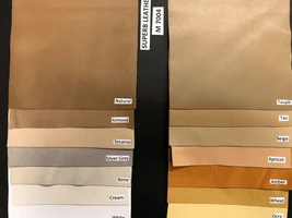 Is the Tan leather less orange in real life?