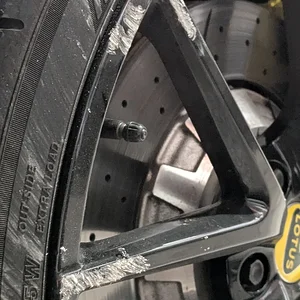 250920-FrontLeftWheelScratches.webp
