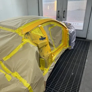 Beaconsfield_Workshop_New_Yellow_Drivers_Side_Prep.webp