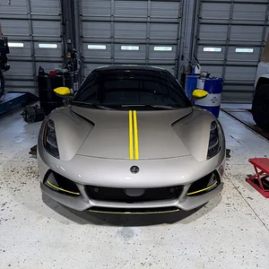 Media '2026 Turbo SE Racing Line Nimbus and Yellow.webp' in category 'Lotus Emira Wallpapers'