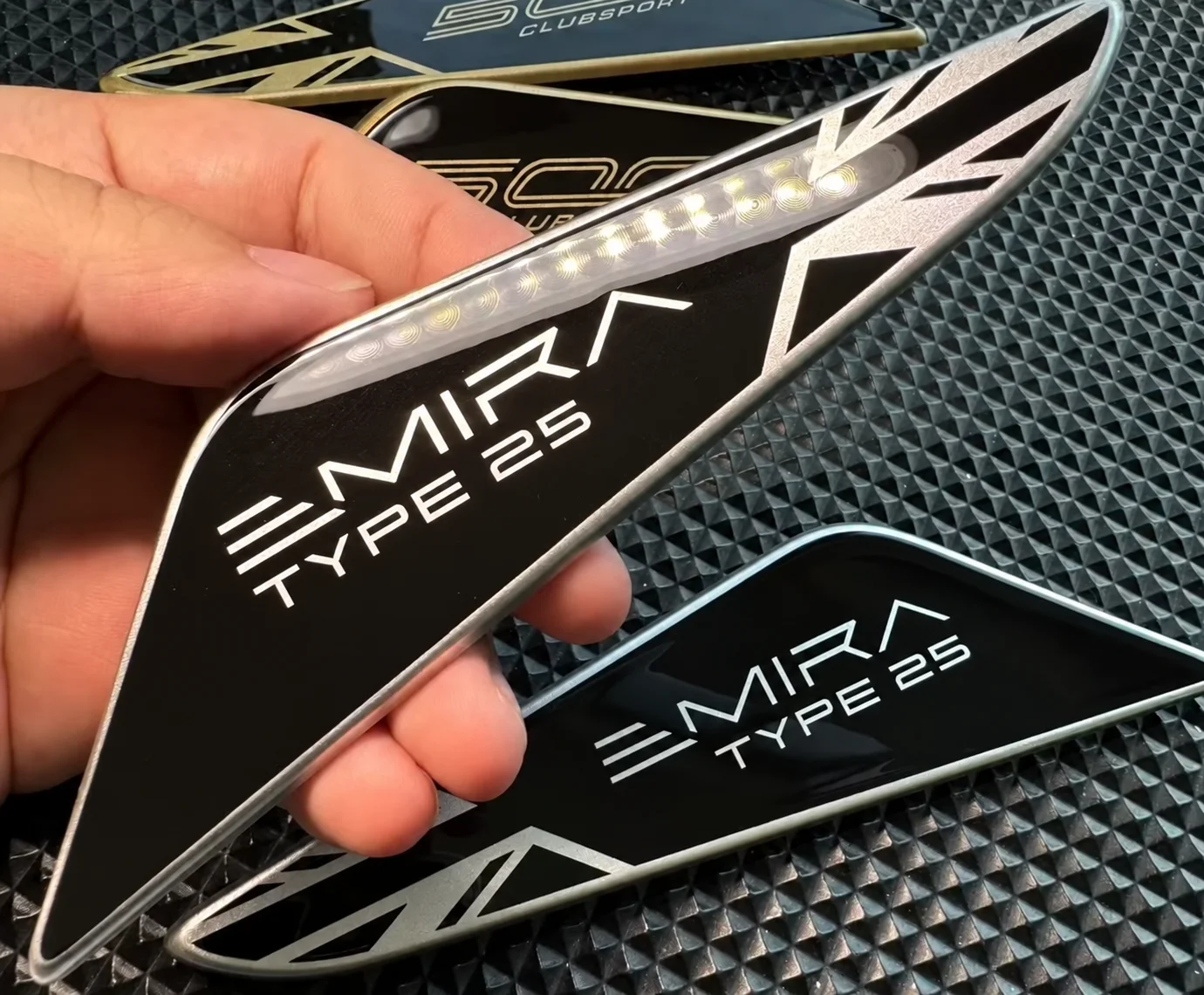 Glossy EMIRA Type 25 Badge Close-Up.webp