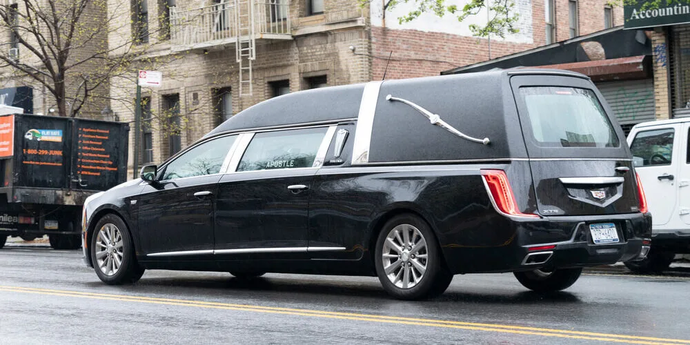 hearse-or-funeral-car-on-the-street-1000x500.jpg