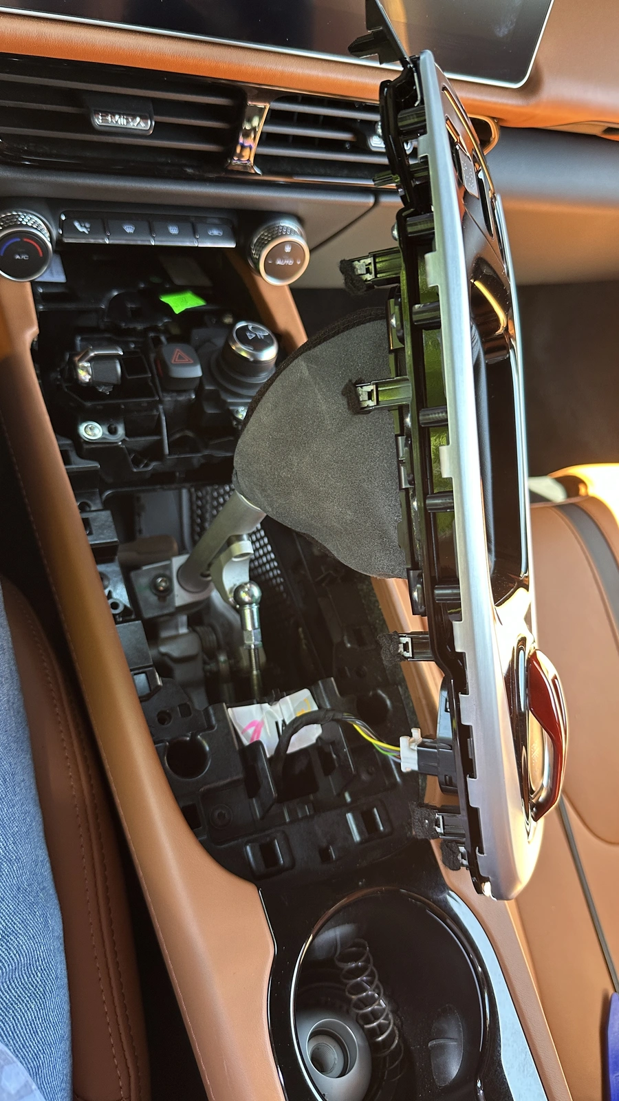 Lotus Emira shifter surround pulled up.webp